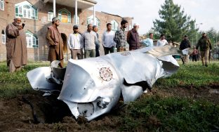 Metal debris lies on the ground in Wuyan in India-administered Kashmir's Pulwama district May 7, 2025. REUTERS/Sharafat Ali     TPX IMAGES OF THE DAY