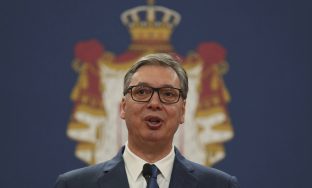 Serbian President Aleksandar Vucic attends a news conference with Former Jamaican sprinter and an ambassador of the EXPO 2027 exhibition Usain Bolt at the Serbia Palace in Belgrade, Serbia, Tuesday, June 17, 2025. (AP Photo/Darko Vojinovic)