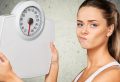 42646543 - dieting, weight scale, women.
