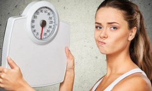 42646543 - dieting, weight scale, women.