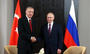 FILE PHOTO: Russian President Vladimir Putin and Turkish President Tayyip Erdogan shake hands during a meeting on the sidelines of the Shanghai Cooperation Organization (SCO) summit in Samarkand, Uzbekistan September 16, 2022. Sputnik/Alexander Demyanchuk/Pool via REUTERS