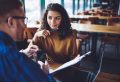 Positive male and female discussing content text for publication during cooperation on publicity area, successful man and woman analyzing information from paper in folder, concept of communication; Shutterstock ID 1362172763; purchase_order: Psychologies; job: Digital